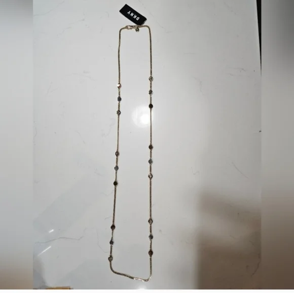 DKNY Tri Tone Crystal & Logo Disc 42" Statement Necklace - Picture 5 of 10